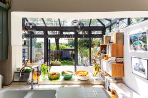 view through conservatory to garden- click for photo gallery